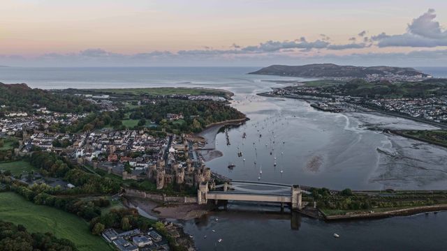 A spectacular sunrise breaks over the historic Conwy Castle, bathing the medieval fortress and surrounding landscape in dramatic golden light in Conwy, Wales, United Kingdom, on 3 October 2026.

(Photo by Mark Cosgrove/News Images)