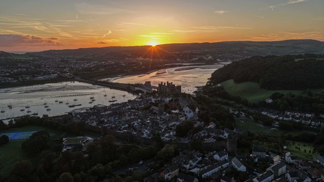 A spectacular sunrise breaks over the historic Conwy Castle, bathing the medieval fortress and surrounding landscape in dramatic golden light in Conwy, Wales, United Kingdom, on 3 October 2026.

(Photo by Mark Cosgrove/News Images)