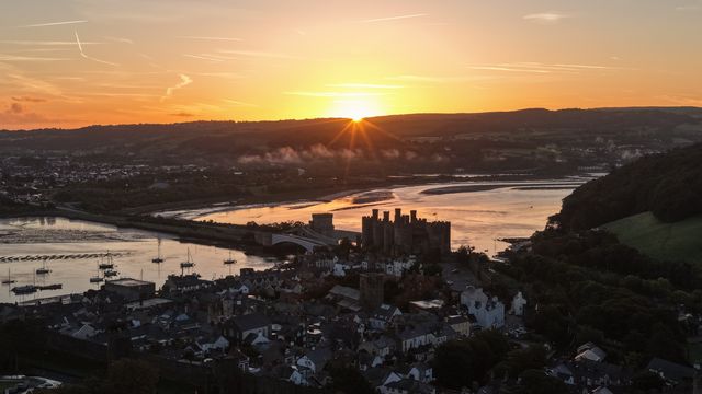 A spectacular sunrise breaks over the historic Conwy Castle, bathing the medieval fortress and surrounding landscape in dramatic golden light in Conwy, Wales, United Kingdom, on 3 October 2026.

(Photo by Mark Cosgrove/News Images)