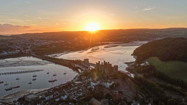 A spectacular sunrise breaks over the historic Conwy Castle, bathing the medieval fortress and surrounding landscape in dramatic golden light in Conwy, Wales, United Kingdom, on 3 October 2026.

(Photo by Mark Cosgrove/News Images)
