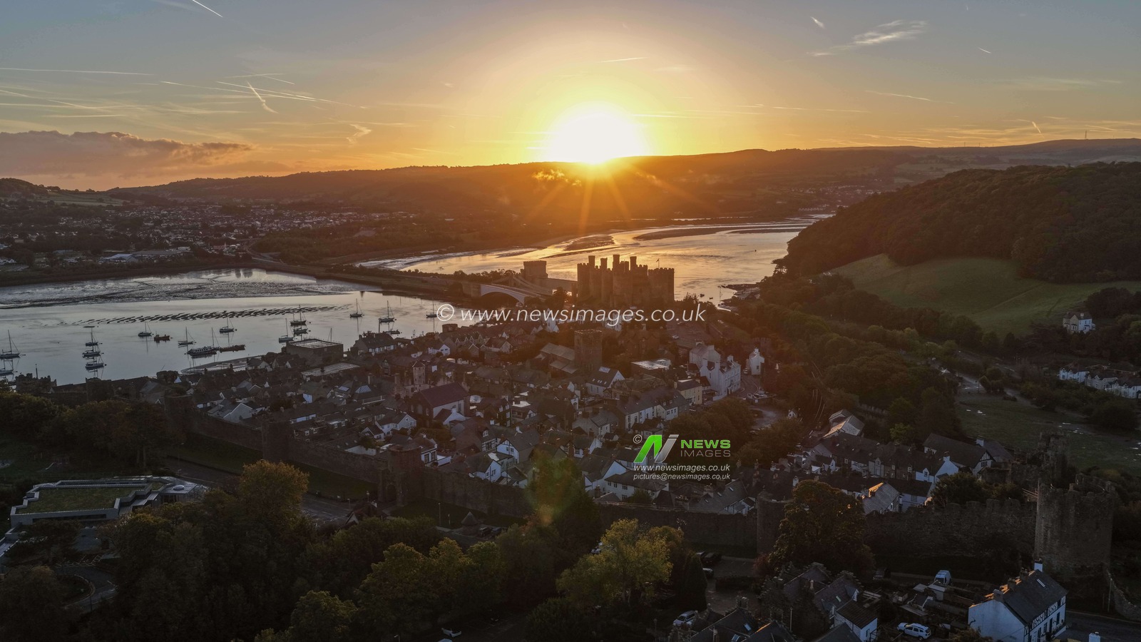 A spectacular sunrise breaks over the historic Conwy Castle, bathing the medieval fortress and surrounding landscape in dramatic golden light in Conwy, Wales, United Kingdom, on 3 October 2026.

(Photo by Mark Cosgrove/News Images)
