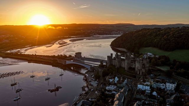A spectacular sunrise breaks over the historic Conwy Castle, bathing the medieval fortress and surrounding landscape in dramatic golden light in Conwy, Wales, United Kingdom, on 3 October 2026.

(Photo by Mark Cosgrove/News Images)