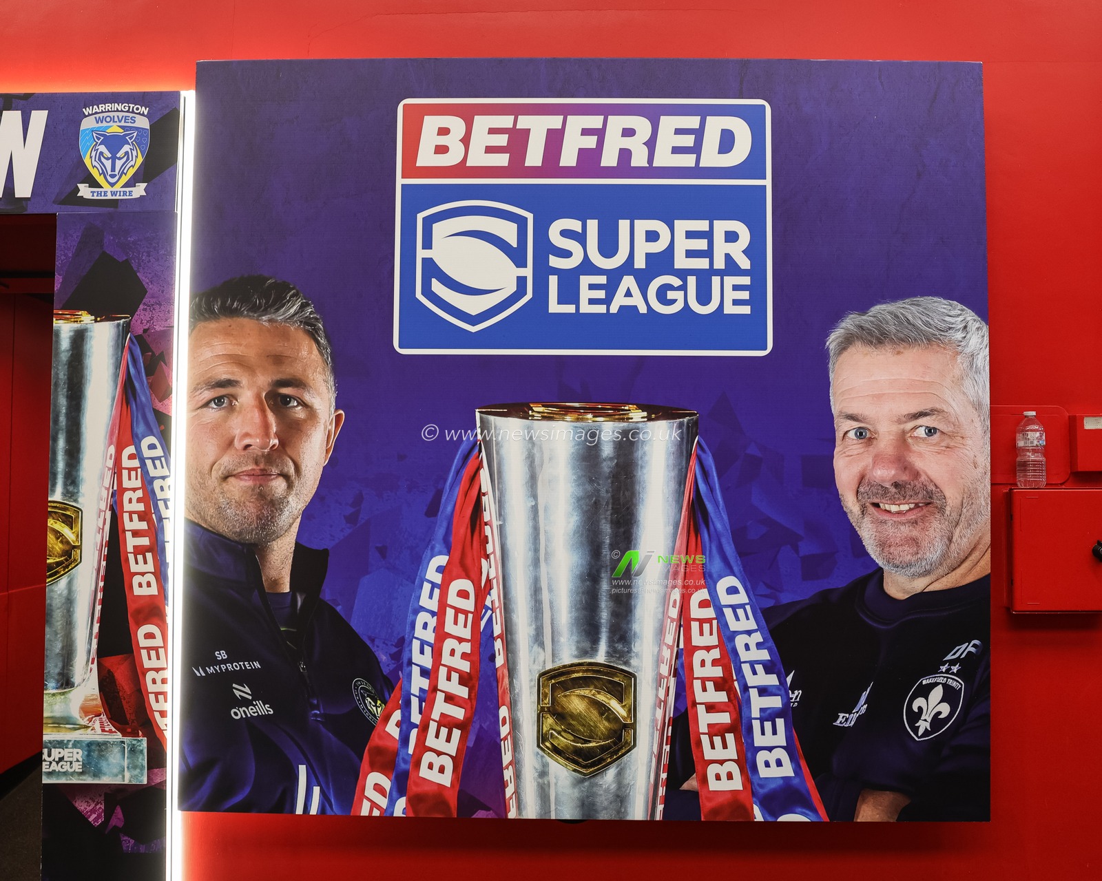 Sam Burgess manager of Warrington Wolves and Daryl Powell manager of Wakefield Trinity on a branded poster during the Betfred Super League Grand Final match Warrington Wolves vs Wakefield Trinity at Old Trafford, Manchester, United Kingdom on 03 October 2026

(Photo by Mark Cosgrove/News Images)