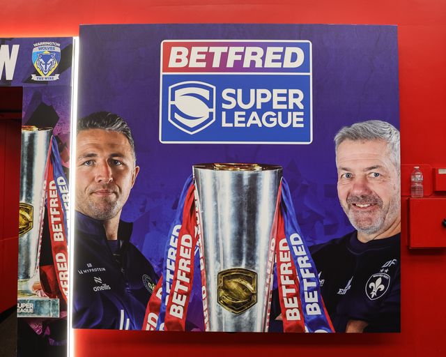Sam Burgess manager of Warrington Wolves and Daryl Powell manager of Wakefield Trinity on a branded poster during the Betfred Super League Grand Final match Warrington Wolves vs Wakefield Trinity at Old Trafford, Manchester, United Kingdom on 03 October 2026

(Photo by Mark Cosgrove/News Images)