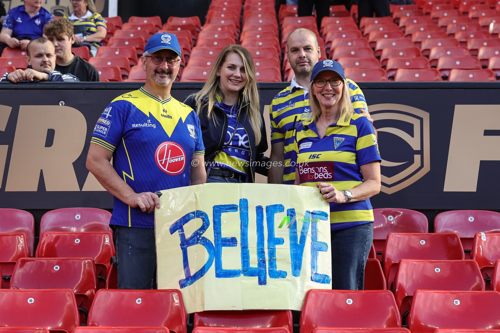 Warrington fans with a Ted Lasso BELIEVE poster during the Betfred Super League Grand Final match Warrington Wolves vs Wakefield Trinity at Old Trafford, Manchester, United Kingdom on 03 October 2026

(Photo by Mark Cosgrove/News Images)