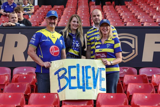 Warrington fans with a Ted Lasso BELIEVE poster during the Betfred Super League Grand Final match Warrington Wolves vs Wakefield Trinity at Old Trafford, Manchester, United Kingdom on 03 October 2026

(Photo by Mark Cosgrove/News Images)