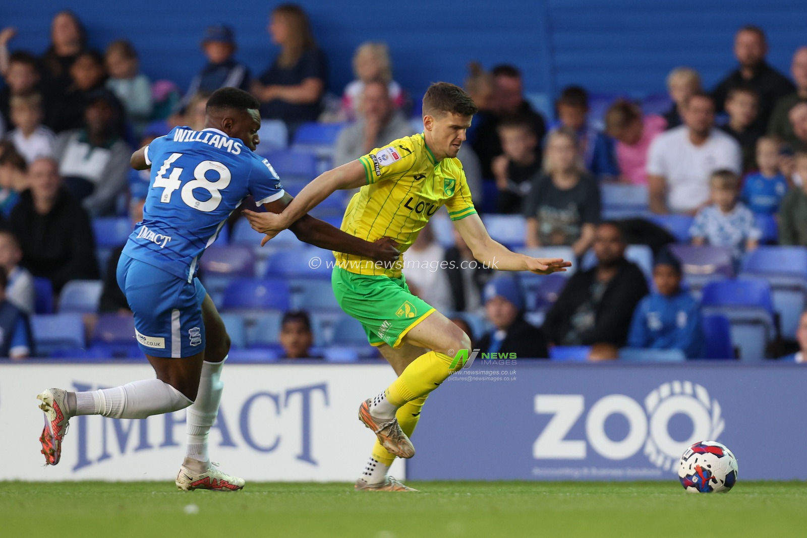 Sam Byram #3 of Norwich City dribbles the ball whilst under pressure from Josh Williams  #48 of Birmingham City
