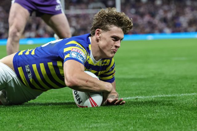 Arron Lindop of Warrington Wolves goes over for a try during the Betfred Super League Grand Final match Warrington Wolves vs Wakefield Trinity at Old Trafford, Manchester, United Kingdom on 03 October 2026

(Photo by Mark Cosgrove/News Images)