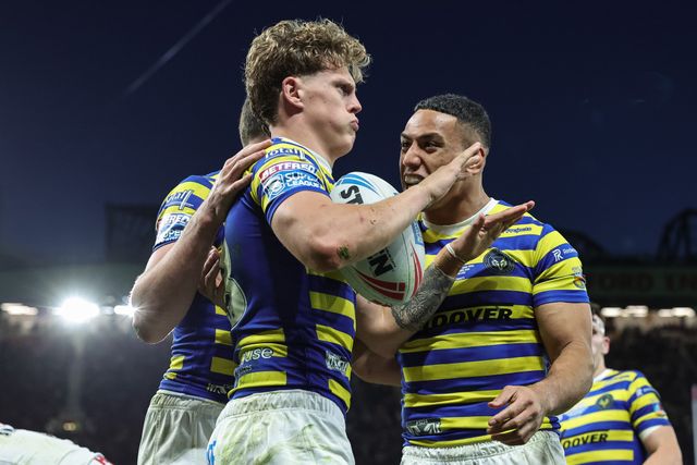 Arron Lindop of Warrington Wolves celebrates his try with teammates during the Betfred Super League Grand Final match Warrington Wolves vs Wakefield Trinity at Old Trafford, Manchester, United Kingdom on 03 October 2026

(Photo by Mark Cosgrove/News Images)