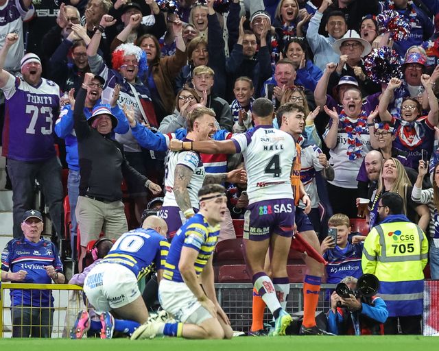 Tom Johnstone of Wakefield Trinity celebrates his try in front of the Trinity fans during the Betfred Super League Grand Final match Warrington Wolves vs Wakefield Trinity at Old Trafford, Manchester, United Kingdom on 03 October 2026

(Photo by Mark Cosgrove/News Images)