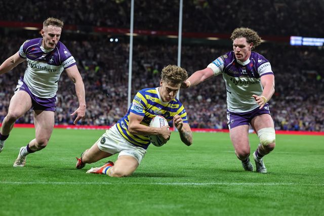 Arron Lindop of Warrington Wolves goes over for a try during the Betfred Super League Grand Final match Warrington Wolves vs Wakefield Trinity at Old Trafford, Manchester, United Kingdom on 03 October 2026

(Photo by Mark Cosgrove/News Images)
