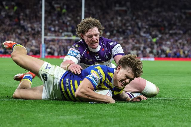 Arron Lindop of Warrington Wolves goes over for a try during the Betfred Super League Grand Final match Warrington Wolves vs Wakefield Trinity at Old Trafford, Manchester, United Kingdom on 03 October 2026

(Photo by Mark Cosgrove/News Images)
