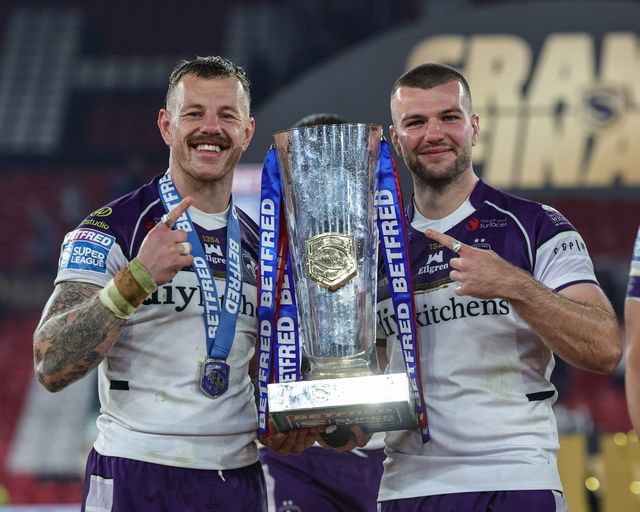 Tom Johnstone of Wakefield Trinity and Max Jowitt of Wakefield Trinity The Betfred Super League Grand Final Trophy during the Betfred Super League Grand Final match Warrington Wolves vs Wakefield Trinity at Old Trafford, Manchester, United Kingdom on 03 October 2026

(Photo by Mark Cosgrove/News Images)