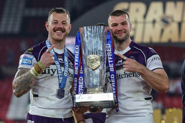 Tom Johnstone of Wakefield Trinity and Max Jowitt of Wakefield Trinity The Betfred Super League Grand Final Trophy during the Betfred Super League Grand Final match Warrington Wolves vs Wakefield Trinity at Old Trafford, Manchester, United Kingdom on 03 October 2026

(Photo by Mark Cosgrove/News Images)