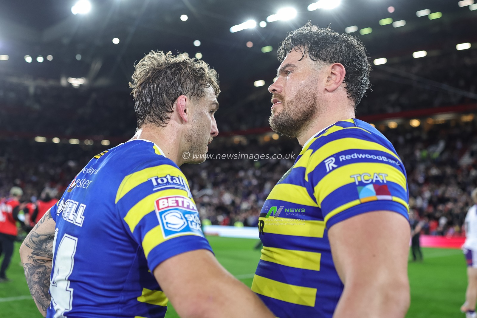 Sam Powell of Warrington Wolves embraces Joe Philbin of Warrington Wolves during the Betfred Super League Grand Final match Warrington Wolves vs Wakefield Trinity at Old Trafford, Manchester, United Kingdom on 03 October 2026

(Photo by Mark Cosgrove/News Images)