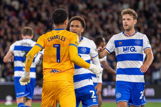 Kealey Adamson of QPR and Nicolas Madsen of QPR congratulate Peirce Charles (gk) of QPR on his penalty save during the Sky Bet Championship match West Ham United vs Queens Park Rangers at London Stadium, London, United Kingdom on 09 October 2026

(Photo by Mike Turner/News Images)