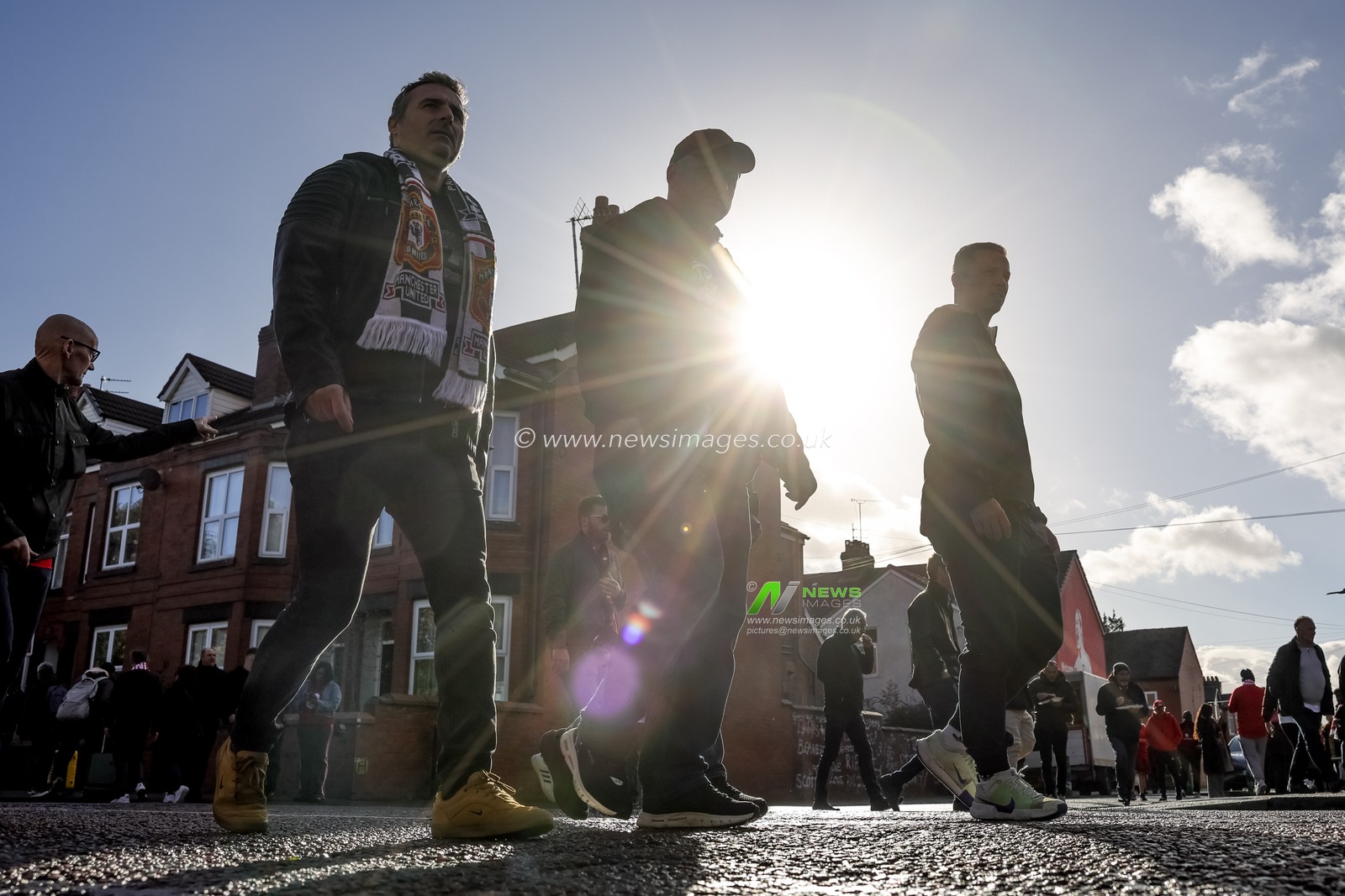 Manchester United fans make their way to Old Trafford during the Premier League match Manchester United vs Tottenham Hotspur at Old Trafford, Manchester, United Kingdom on 10 October 2026

(Photo by Mark Cosgrove/News Images)