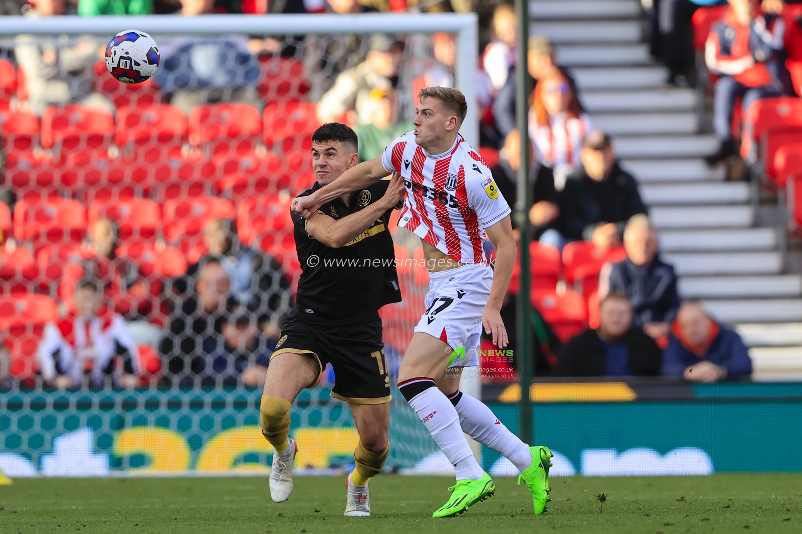 Liam Delap #17 of Stoke City and John Egan #12 of Sheffield United challenge for the ball during the Sky Bet Championship match Stoke City vs Sheffield United at Bet365 Stadium, Stoke-on-Trent, United Kingdom, 8th October 2022

(Photo by Conor Molloy/News Images)