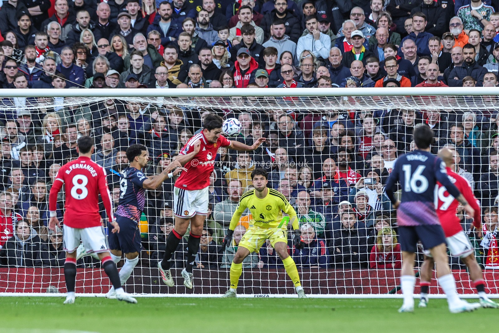 Harry Maguire of Manchester United heads the ball clear during the Premier League match Manchester United vs Tottenham Hotspur at Old Trafford, Manchester, United Kingdom on 10 October 2026

(Photo by Mark Cosgrove/News Images)