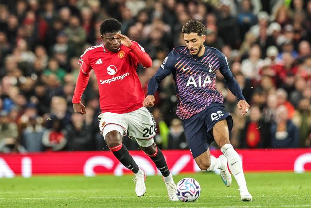 Carlos Baleba of Manchester United and Omar Marmoush of Tottenham Hotspur battle for the ball during the Premier League match Manchester United vs Tottenham Hotspur at Old Trafford, Manchester, United Kingdom on 10 October 2026

(Photo by Mark Cosgrove/News Images)