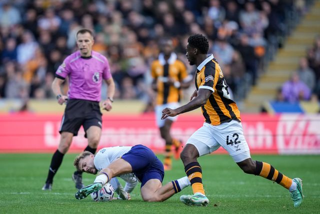 Tim Iroegbunam of Hull City is tackled by  Kiernan Dewsbury-Hall of Everton during the Premier League match Hull City vs Everton at MKM Stadium, Hull, United Kingdom on 11 October 2026

(Photo by Maynard Manyowa/News Images)