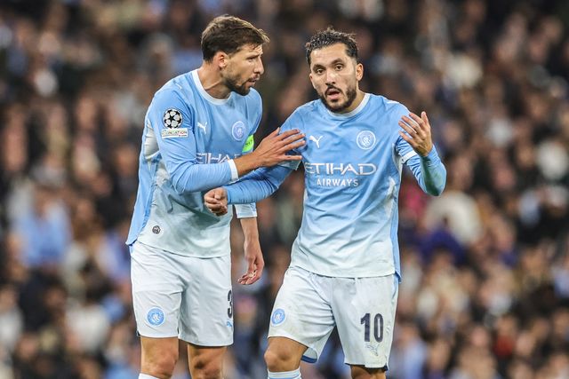Ruben Dias of Manchester City has a discussion with Rayan Cherki of Manchester City during the UEFA Champions League Matchday 2 of 8 match Manchester City vs Paris Saint-Germain at City of Manchester Stadium, Manchester, United Kingdom on 14 October 2026

(Photo by Mark Cosgrove/News Images)