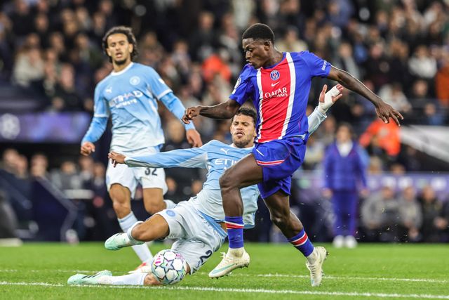 Matheus Nunes of Manchester City fouls Nuno Mendes of Paris Saint-Germain for a penalty during the UEFA Champions League Matchday 2 of 8 match Manchester City vs Paris Saint-Germain at City of Manchester Stadium, Manchester, United Kingdom on 14 October 2026

(Photo by Mark Cosgrove/News Images)