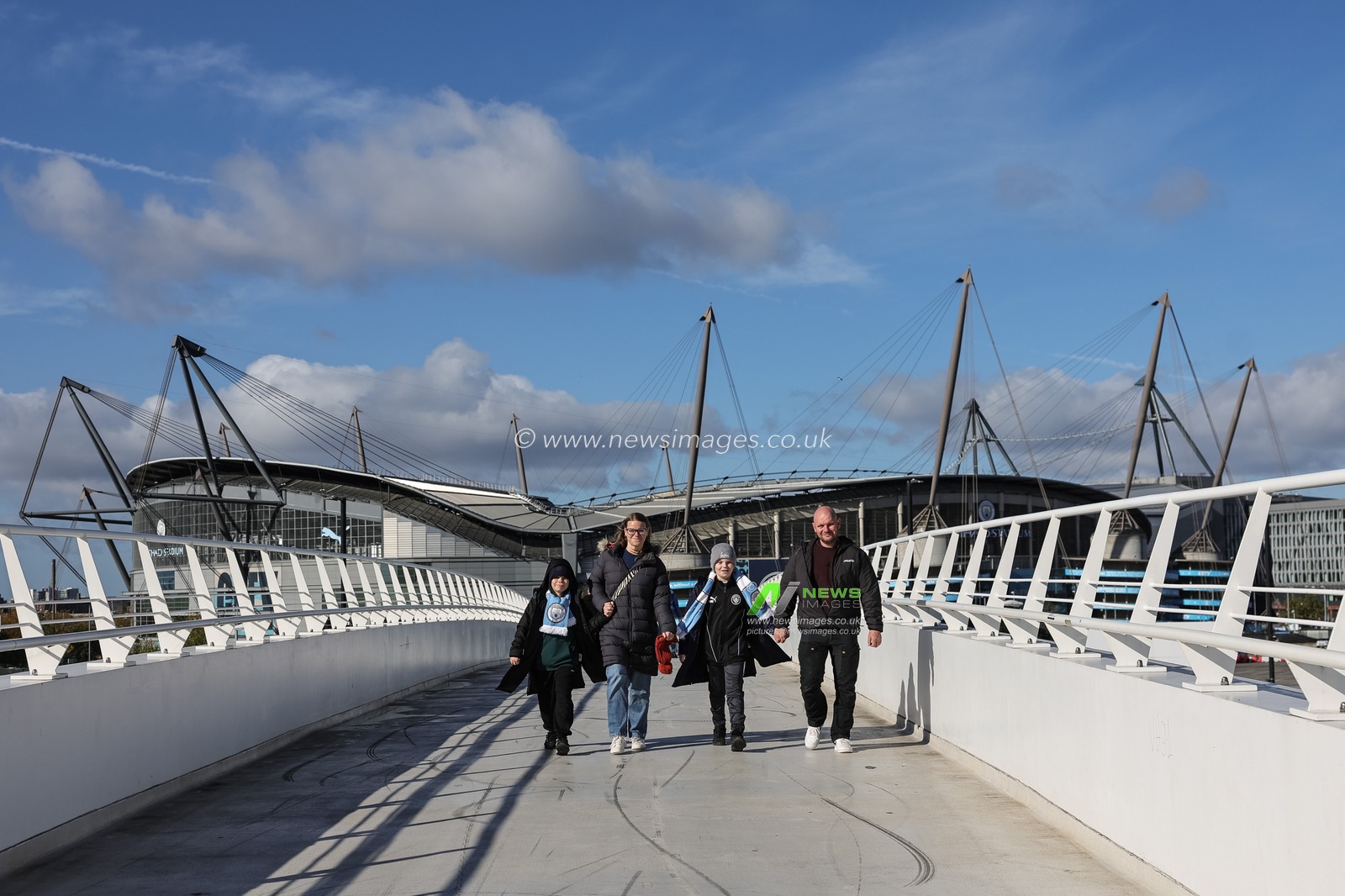 Manchester City fans walk across the bridge during the Premier League match Manchester City vs Ipswich Town at Etihad Stadium, Manchester, United Kingdom on 17 October 2026

(Photo by Mark Cosgrove/News Images)
