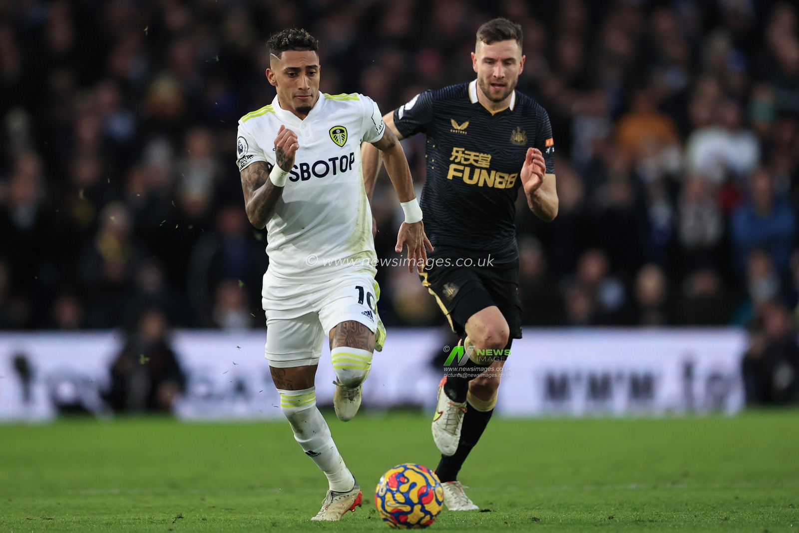 Raphinha #10 of Leeds United makes a break during the Premier League fixture Leeds United vs Newcastle United at Elland Road, Leeds, UK, 22nd January 2022