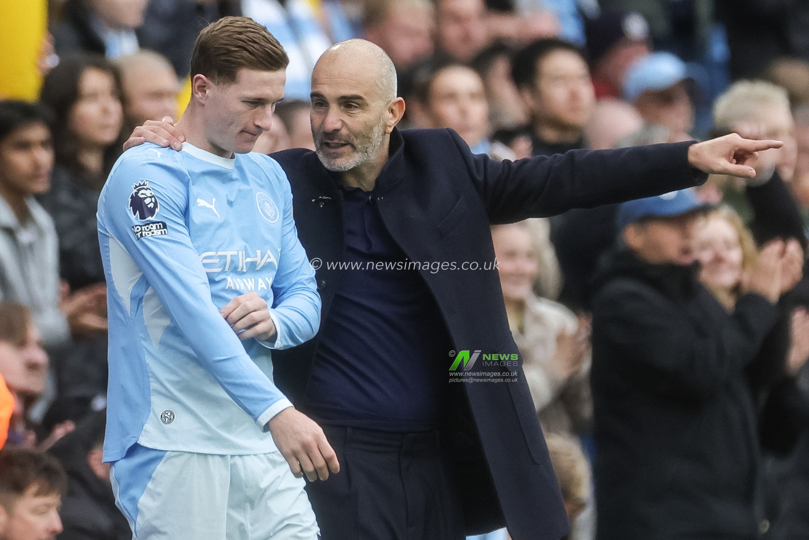 Enzo Maresca manager of Manchester City gives instruction to Elliot Anderson of Manchester City as he prepares to be substituted on in the second half during the Premier League match Manchester City vs Ipswich Town at Etihad Stadium, Manchester, United Kingdom on 17 October 2026

(Photo by Mark Cosgrove/News Images)