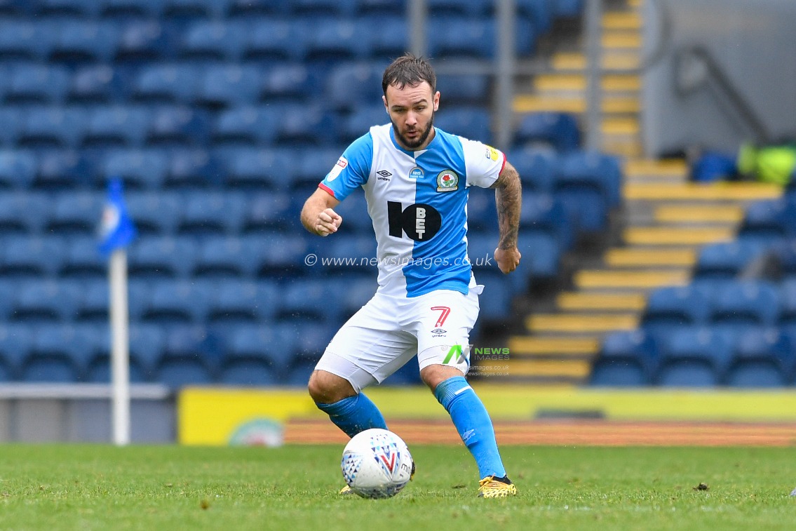Adam Armstrong (7) of Blackburn Rovers looks to control the ball