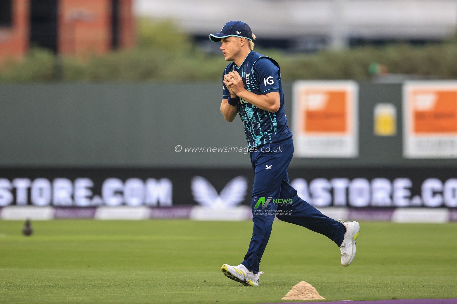 Sam Curran of England catches out Janneman Malan of South Africa