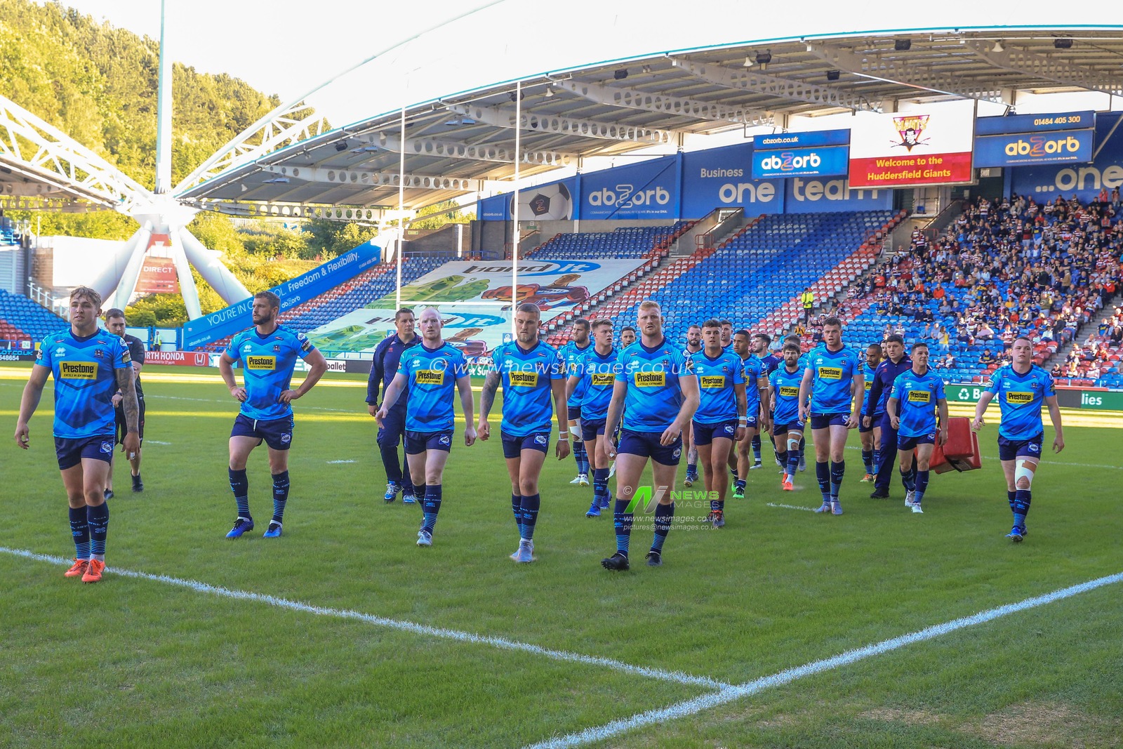 21st June 2019 , John Smiths Stadium, Huddersfield, England; Betfred Super League, Round 19, Huddersfield Giants vs Wigan Warriors ; Wigan players leave the pitch after warming up


Credit: Mark Cosgrove/News Images