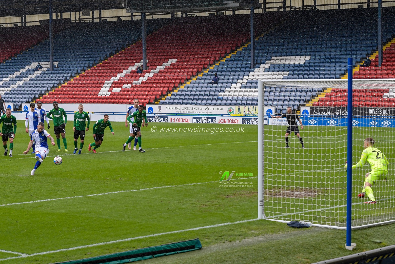 Adam Armstrong #7 of Blackburn Rovers scores a penalty to make it 1-1