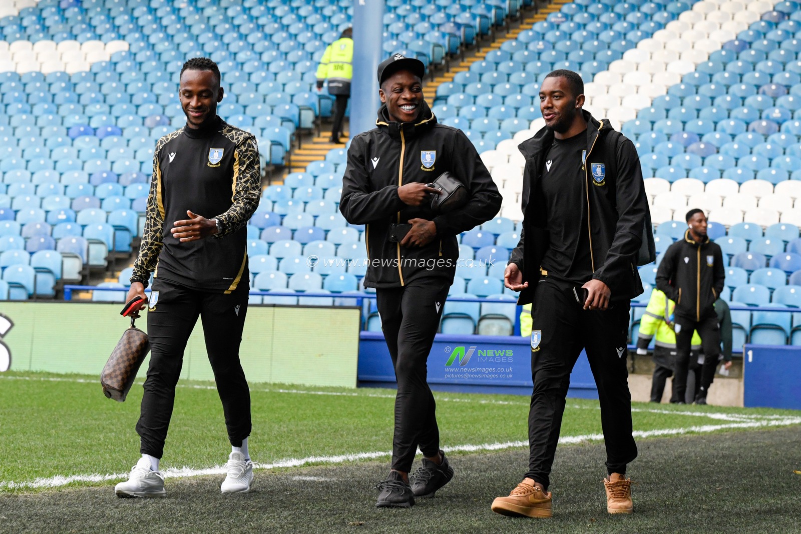 Saido Berahino #24, Dennis Adeniran #8 and Jaden Brown #3 of Sheffield Wednesday arrive at Hillsborough