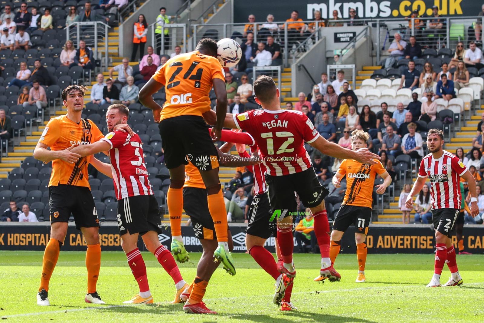 Di'Shon Bernard #24 of Hull City gets up to head the ball which goes wide of the goal