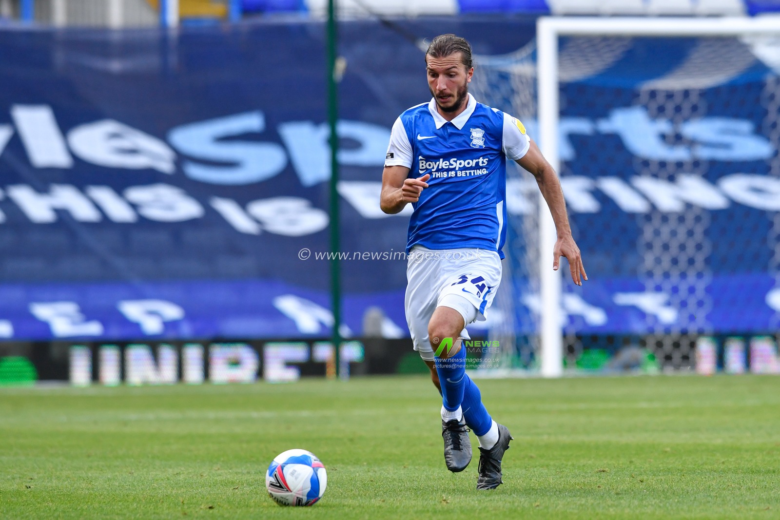 Ivan Sunjic (34) of Birmingham City runs with the ball
