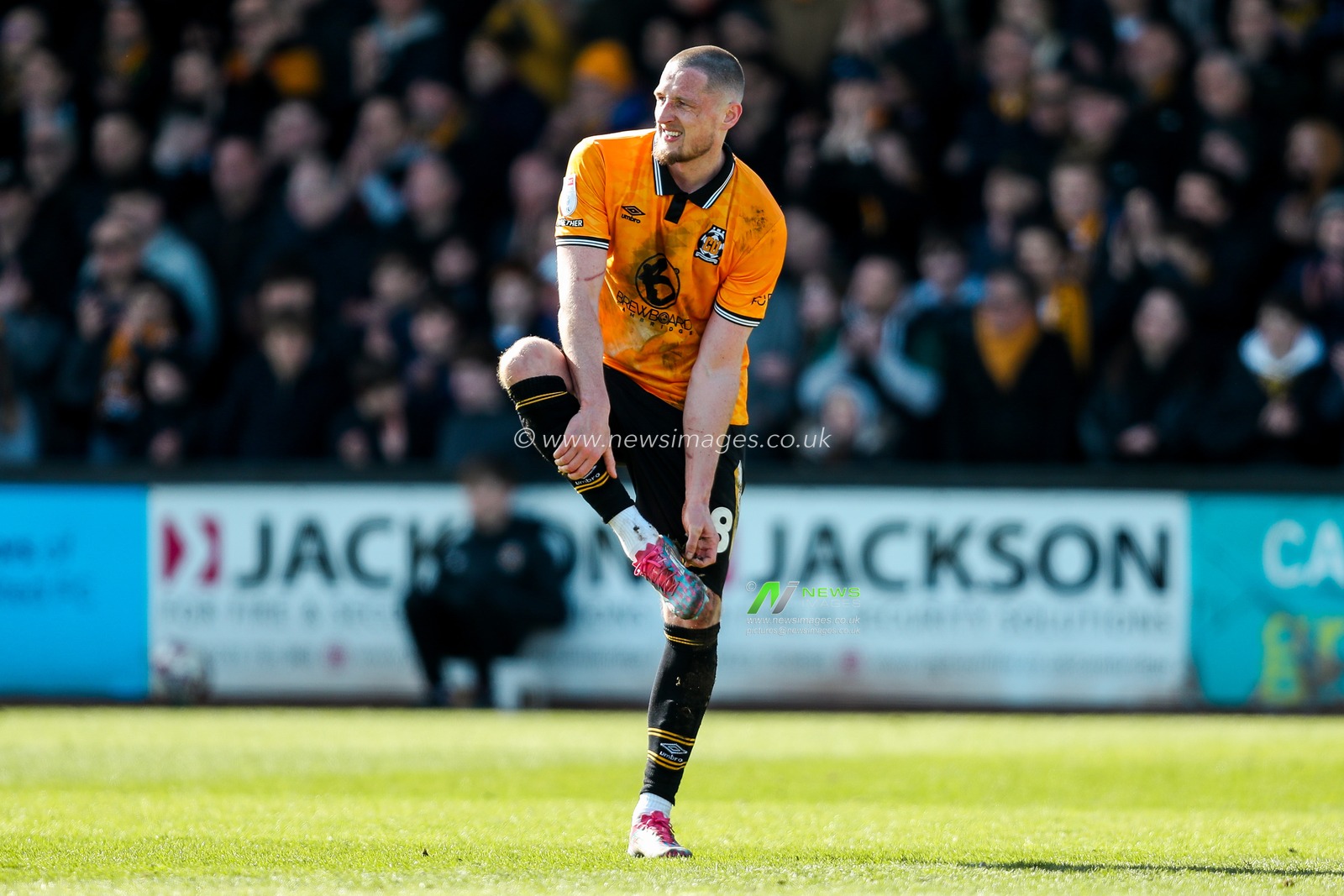 Ryan Loft of Cambridge United pulls grass out of his shoe during the Sky Bet League 1 match Cambridge United vs Peterborough United at Cledara Abbey Stadium, Cambridge, United Kingdom, 15th March 2025

(Photo by Izzy Poles/News Images)