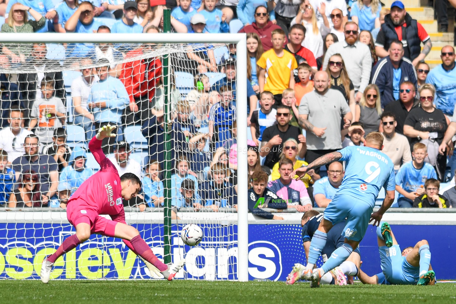 Lee Nicholls #21 of Huddersfield Town makes a save