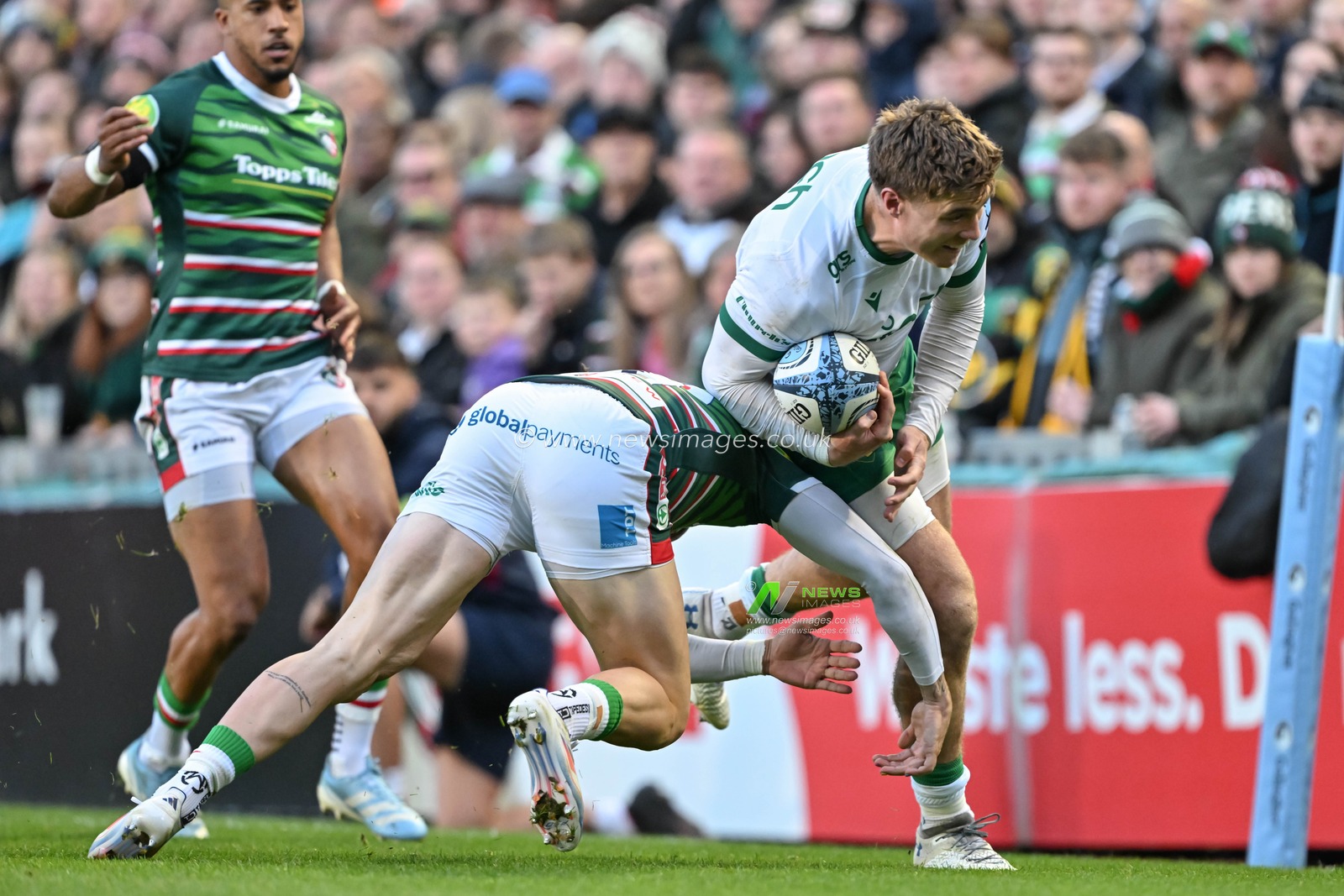 Ollie Hassell-Collins of Leicester Tigers attempts a challenge on Tommy Freeman of Northampton Saints during the Gallagher Premiership match Leicester Tigers vs Northampton Saints at Mattioli Woods Welford Road Stadium, Leicester, United Kingdom, 12th October 2024

(Photo by Cody Froggatt/News Images)