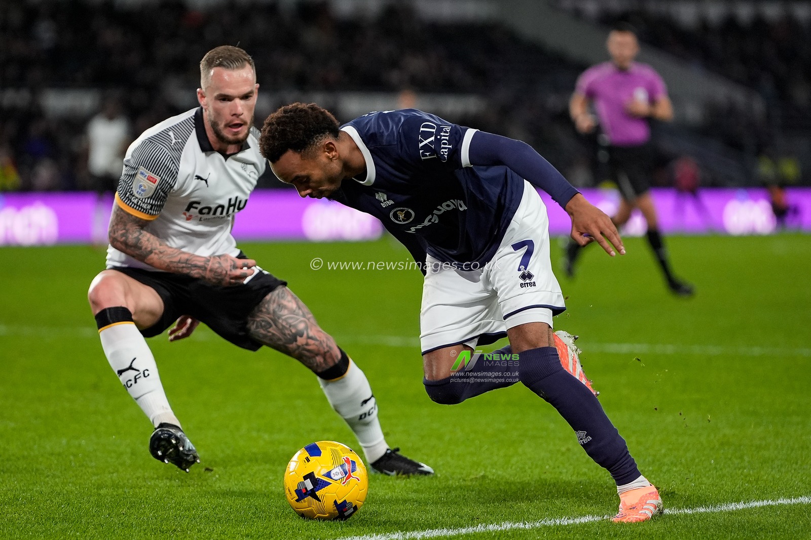 Thierno Ballo of Millwall dribbles the ball under a challenge from Joe Ward of Derby County during the Sky Bet Championship match Derby County vs Millwall at Pride Park Stadium, Derby, United Kingdom, 10th December 2025

(Photo by Maynard Manyowa/News Images)

*** GER AUT SUI OUT ***