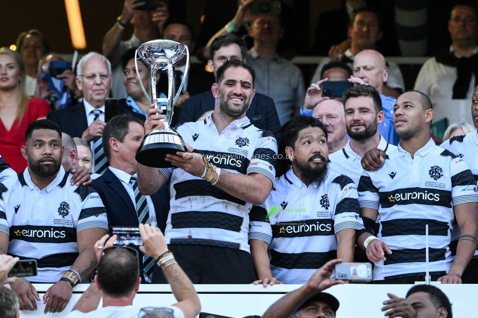 Sam Whitelock of Barbarians lifts the trophy during the Killik Cup match Barbarians vs Fiji at Twickenham Stadium, Twickenham, United Kingdom, 22nd June 2024

(Photo by Craig Thomas/News Images)
