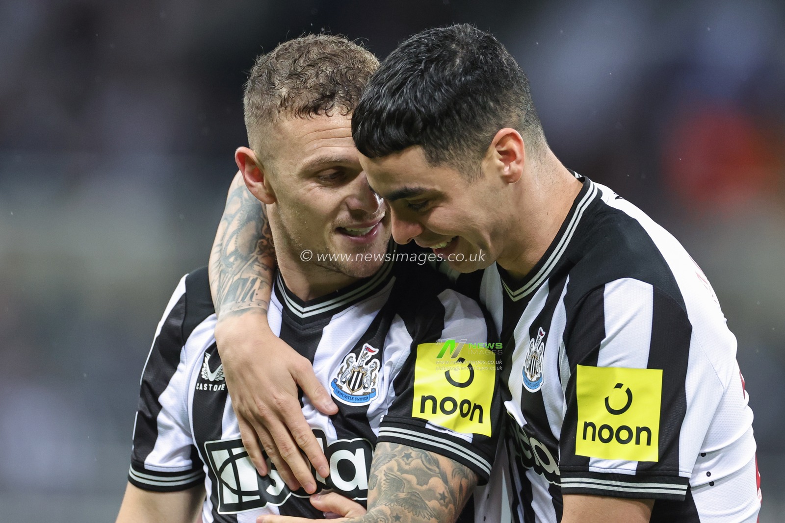 Kieran Trippier #2 of Newcastle United and Miguel AlmirÃ³n #24 of Newcastle United celebrate their teams win after the UEFA Champions League match Newcastle United vs Paris Saint-Germain at St. James's Park, Newcastle, United Kingdom, 4th October 2023

(Photo by Mark Cosgrove/News Images)