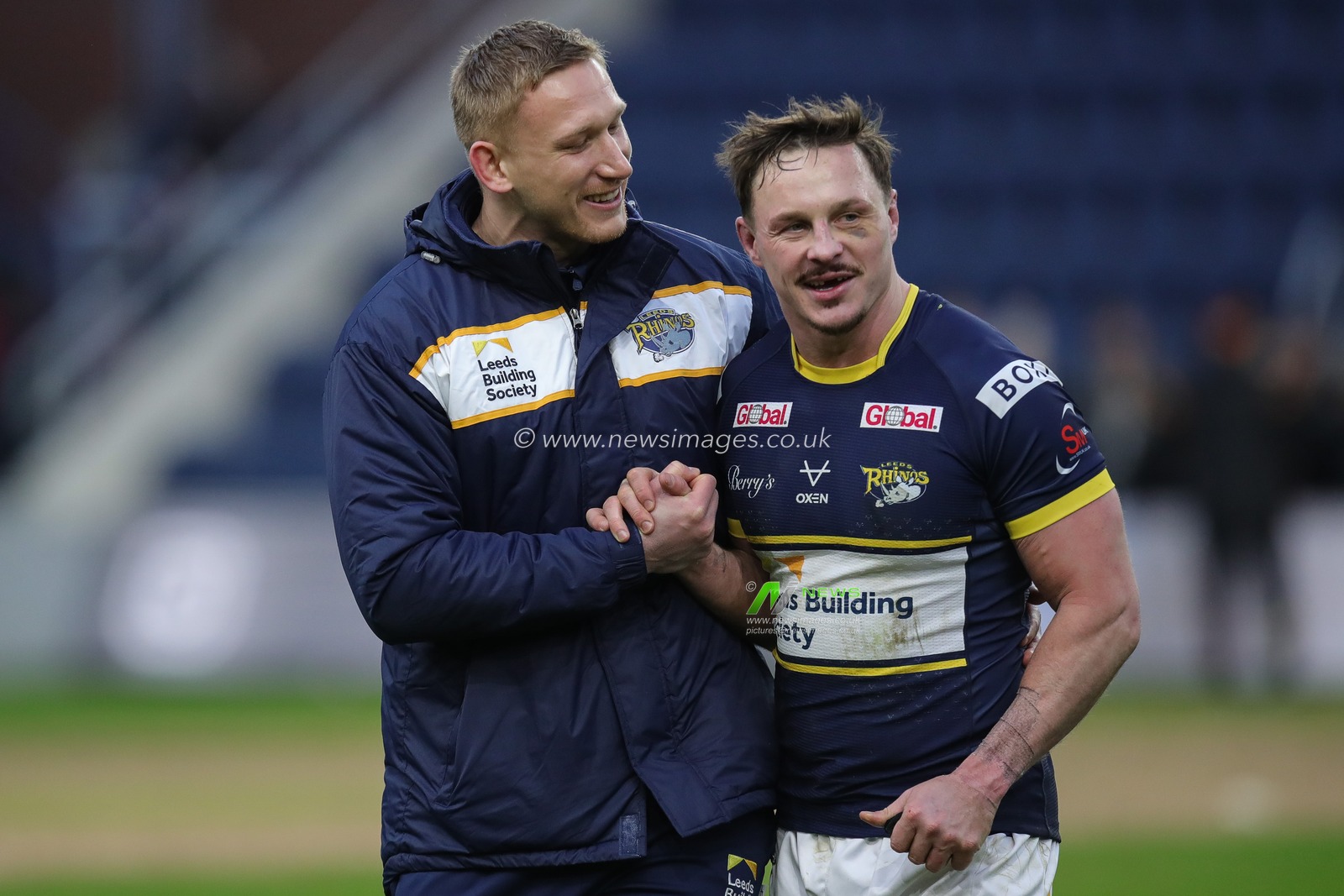 Mikolaj Oledzki #8 of Leeds Rhinos and James Donaldson #25 of Leeds Rhinos celebrate the win after the Rugby League Pre Season match Leeds Rhinos vs Bradford Bulls at Headingley Stadium, Leeds, United Kingdom, 29th January 2023

(Photo by James Heaton/News Images)