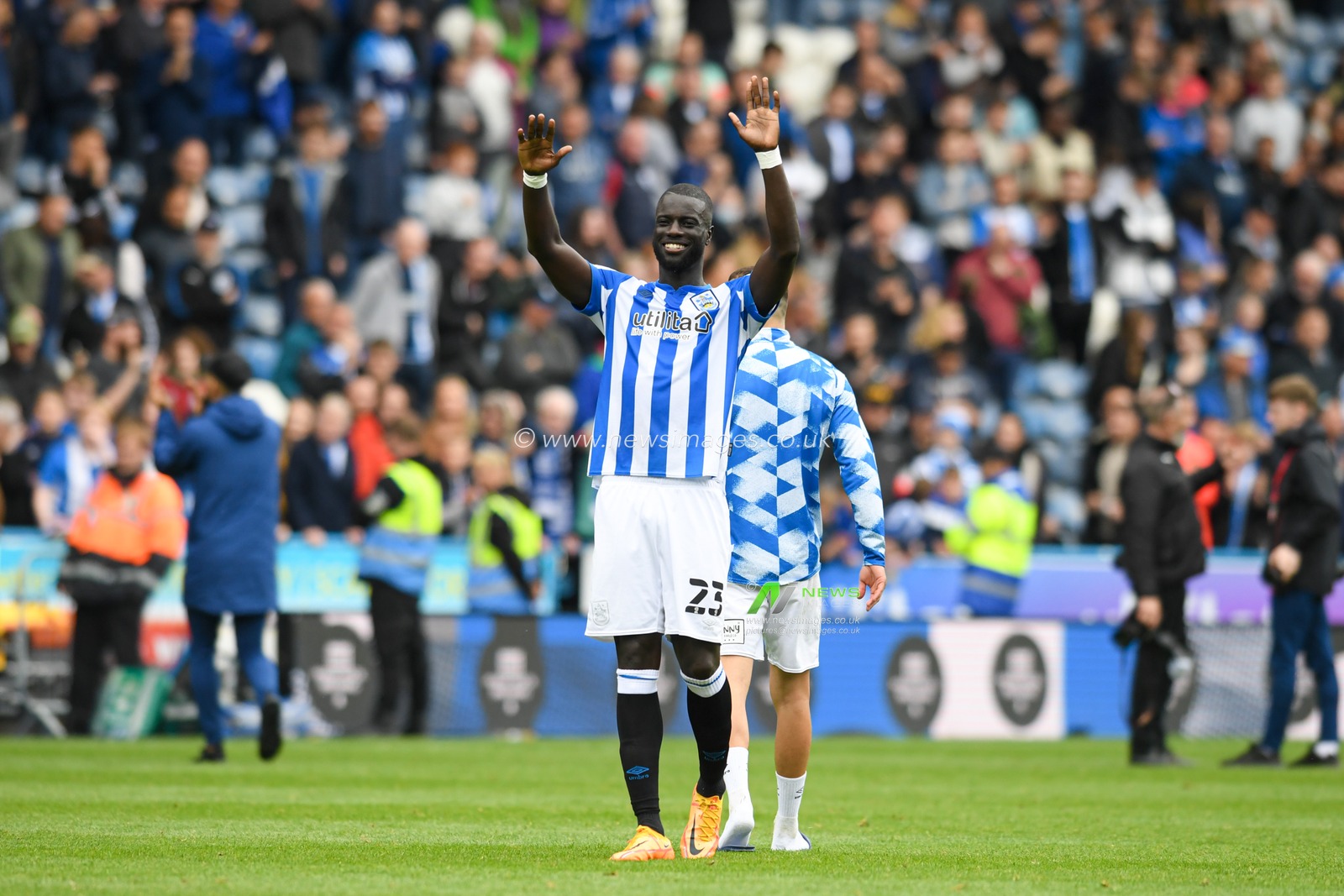Mouhamadou-Naby Sarr #23 of Huddersfield Town thanks the home supporters at the end of the game after his side beat Bristol City 2-0