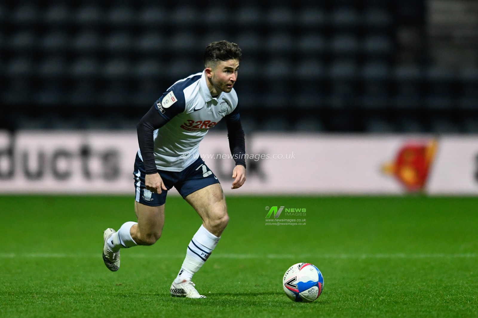 Sean Maguire #24 of Preston North End runs forward with the ball