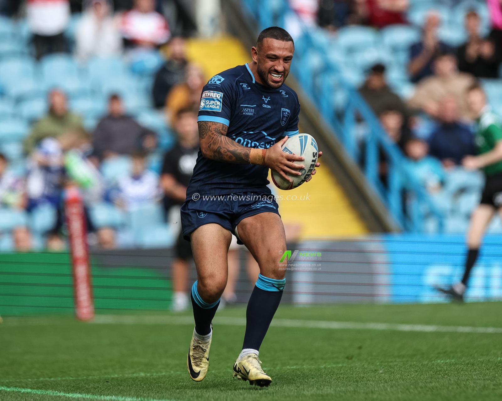 Elliot Minchella of Hull KR breaks through to go over for a 30 yard solo try during the Magic Weekend match Catalans Dragons vs Hull KR at Elland Road, Leeds, United Kingdom, 18th August 2024

(Photo by Mark Cosgrove/News Images)
