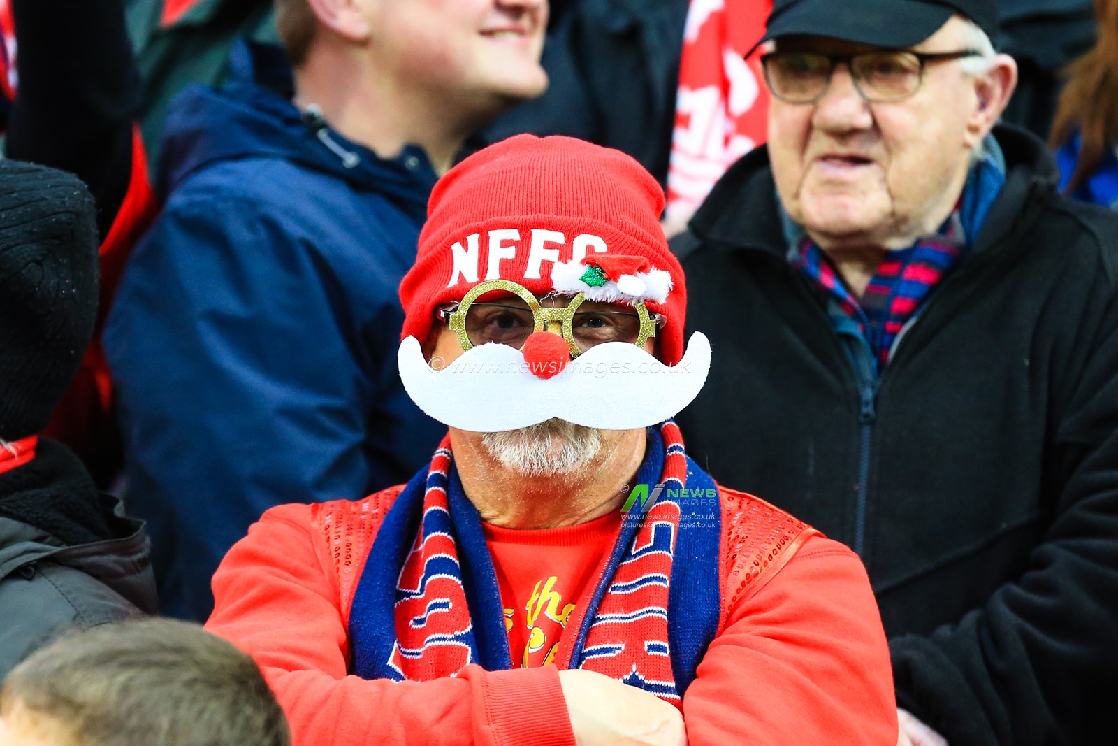 26th December 2018, Carrow Road, Norfolk, England; Sky Bet Championship, Norwich City vs Nottingham Forest ;  A Notts Forest fan poses as Santa ahead of the Boxing Day fixture.

Credit: Georgie Kerr/News Images

English Football League images are subject to DataCo Licence