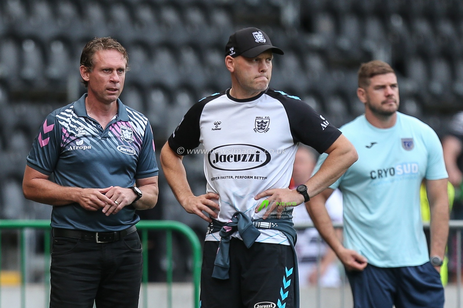 Brett Hodgson Head Coach of Hull FC watches his players walk around the pitch
