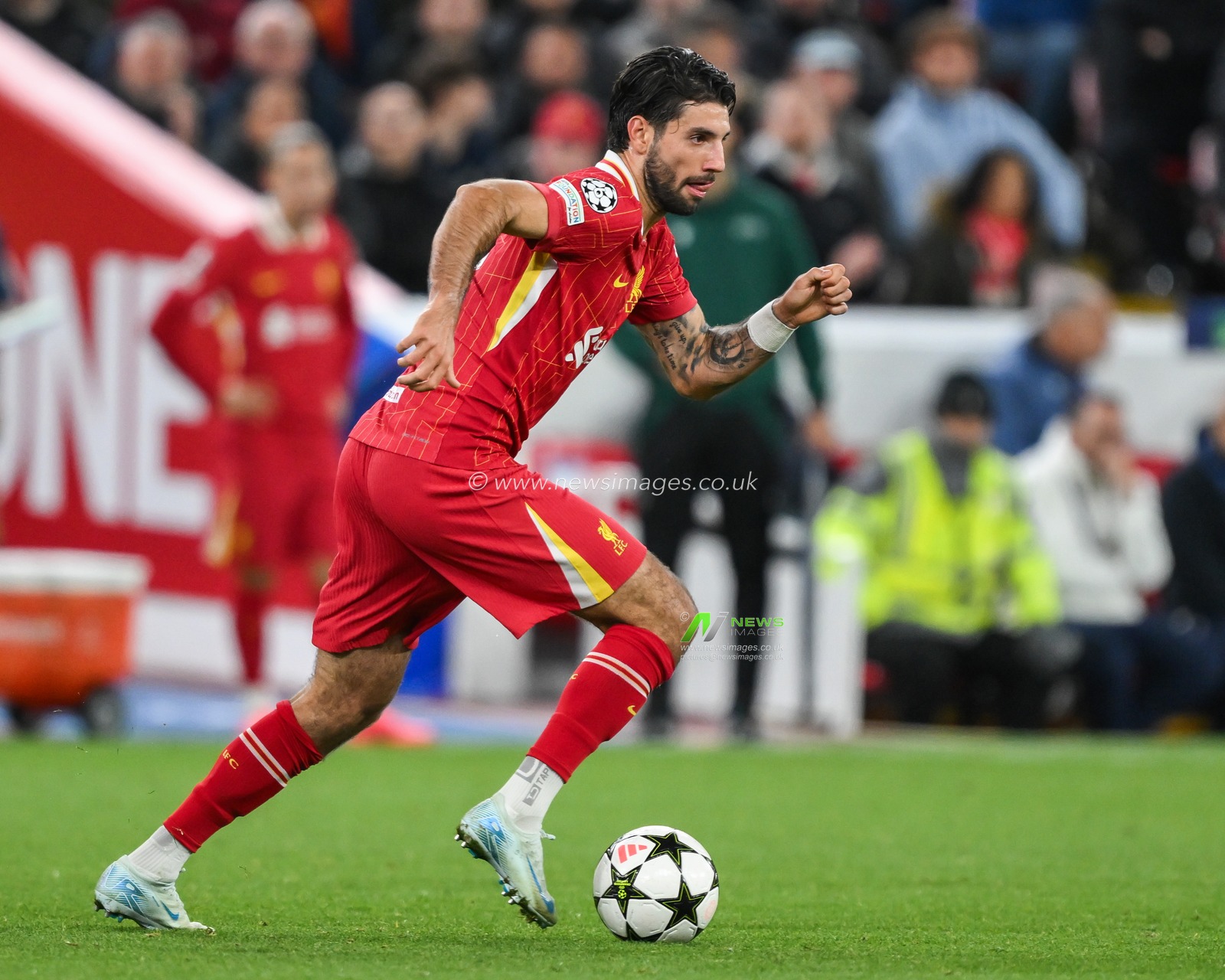 Dominik Szoboszlai of Liverpool breaks with the ball during the UEFA Champions League  - League Stage match Liverpool vs Bologna at Anfield, Liverpool, United Kingdom, 2nd October 2024

(Photo by Craig Thomas/News Images)